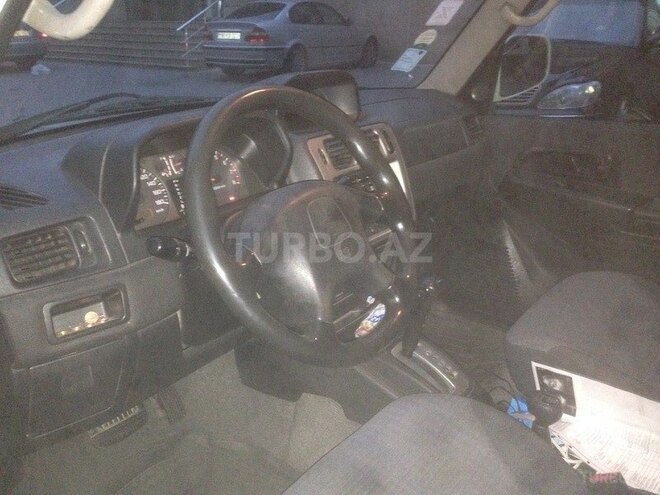 Mitsubishi Pajero io 1999, 313,000 km - 1.8 l - Bakı