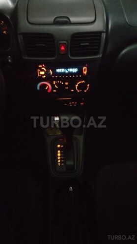 Nissan Sunny 2008, 179,000 km - 1.6 l - Bakı