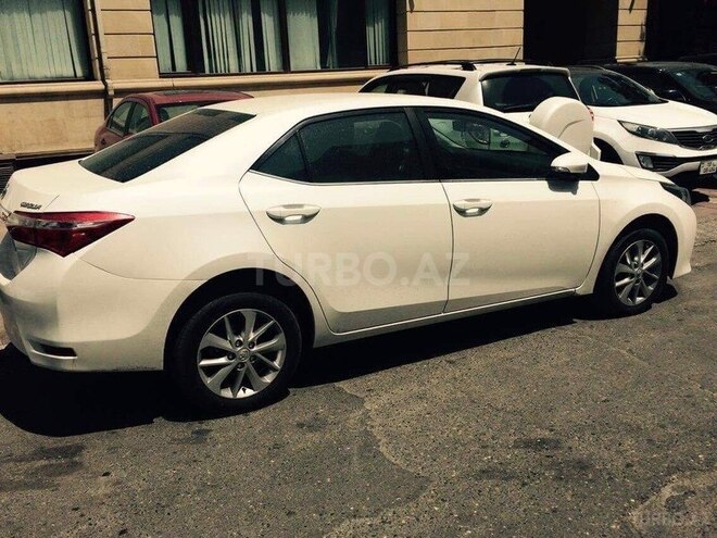 Toyota Corolla 2013, 100,000 km - 1.6 л - Bakı