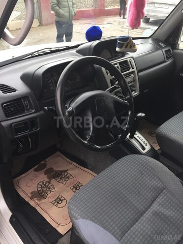 Mitsubishi Pajero io 1999, 254,138 km - 1.8 l - Bakı