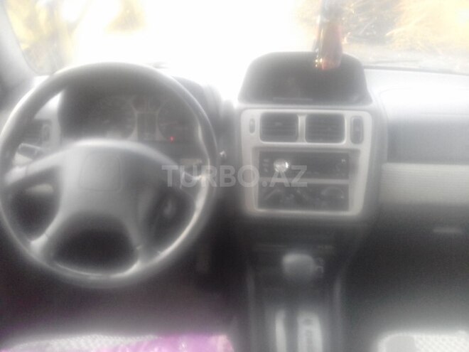 Mitsubishi Pajero io 1999, 150,000 km - 0.2 l - Şəki