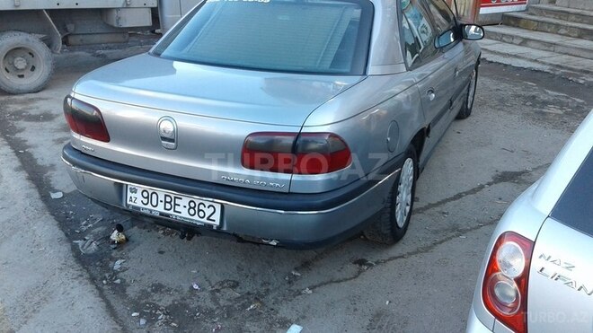 Opel Omega 1994, 300,000 km - 2.0 l - Quba