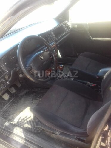 Opel Vectra 1998, 284,800 km - 1.6 l - Quba