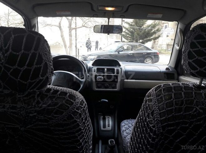 Mitsubishi Pajero io 1999, 300,000 km - 1.8 л - Bakı