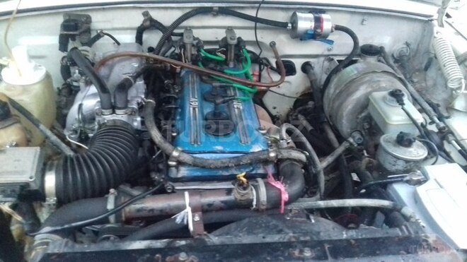 GAZ 3110 2001, 220,558 km - 2.4 l - Quba