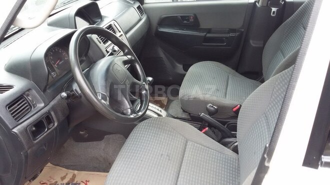 Mitsubishi Pajero io 1999, 287,000 km - 1.8 l - Yevlax