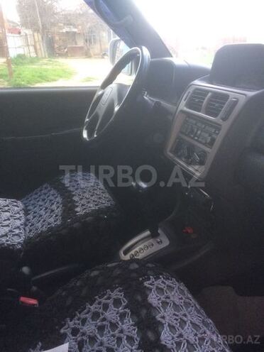 Mitsubishi Pajero io 1999, 250,000 km - 2.0 l - Bakı