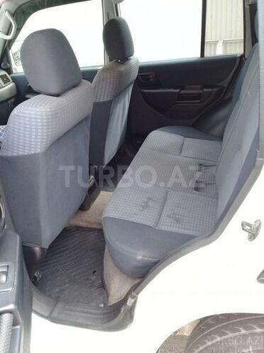 Mitsubishi Pajero io 2001, 158,642 km - 1.8 l - Bakı