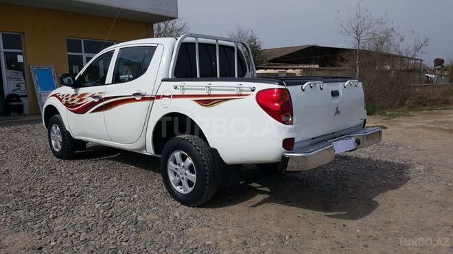 Mitsubishi L200 2012, 110,000 km - 2.5 л - Salyan