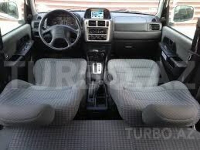Mitsubishi Pajero io 1999, 250,000 km - 0.2 l - Bakı