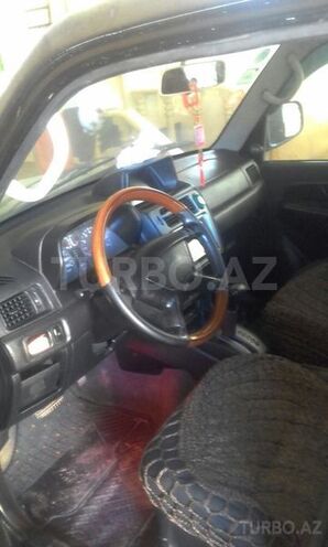Mitsubishi Pajero io 2001, 59,000 km - 2.0 l - Bakı