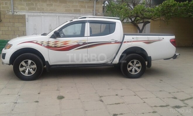 Mitsubishi L200 2011, 150,053 km - 2.5 л - Salyan