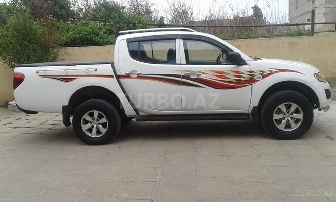 Mitsubishi L200 2011, 150,053 km - 2.5 л - Salyan
