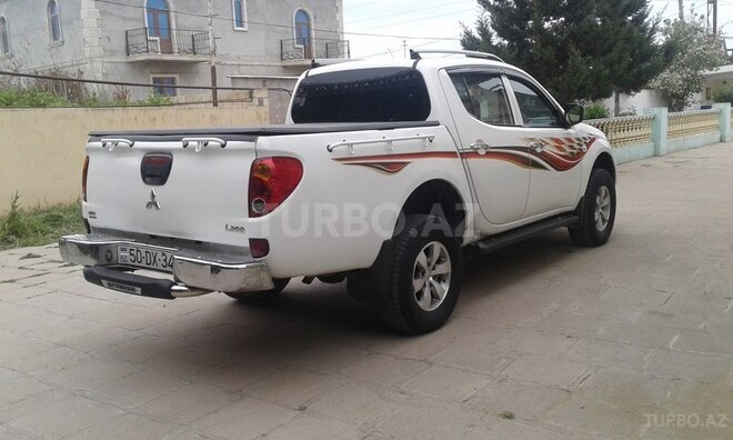 Mitsubishi L200 2011, 150,053 km - 2.5 л - Salyan