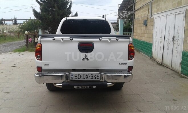 Mitsubishi L200 2011, 150,053 km - 2.5 л - Salyan