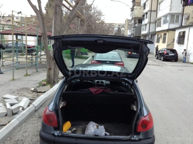 Peugeot 206 2006, 205,000 km - 1.4 l - Bakı