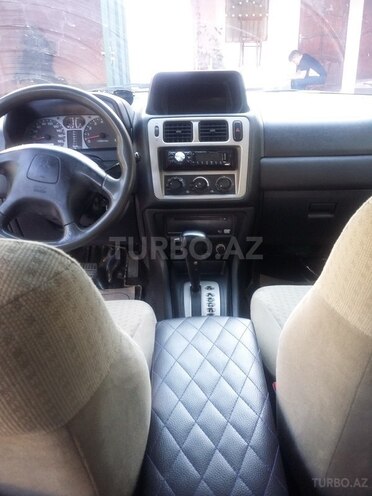 Mitsubishi Pajero io 2002, 241,000 km - 0.2 l - Bakı
