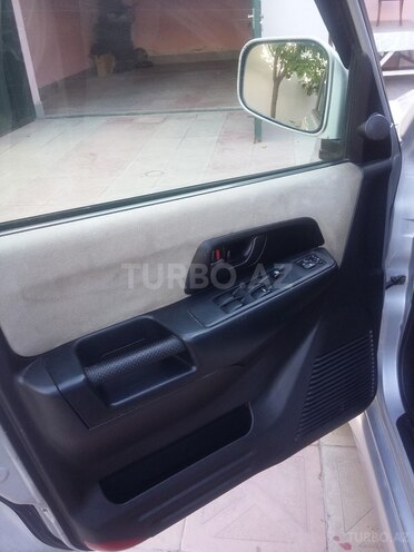 Mitsubishi Pajero io 2002, 241,000 km - 0.2 l - Bakı