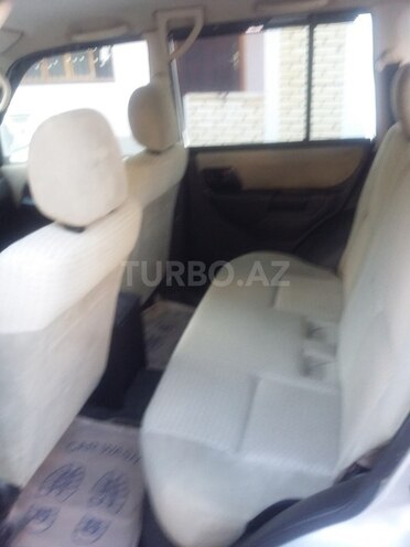 Mitsubishi Pajero io 2002, 241,000 km - 0.2 l - Bakı