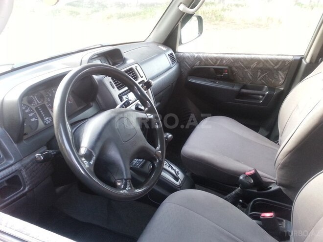 Mitsubishi Pajero io 1999, 223,000 km - 1.8 l - Bakı