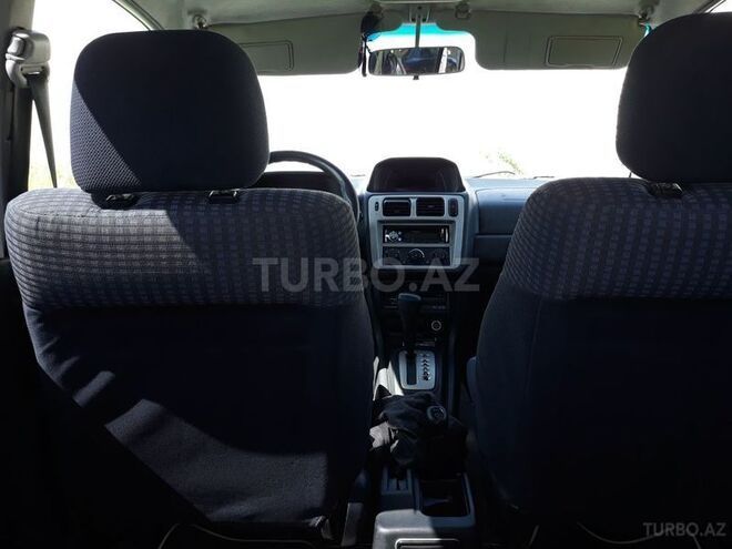 Mitsubishi Pajero io 1999, 150,000 km - 1.8 л - Qazax