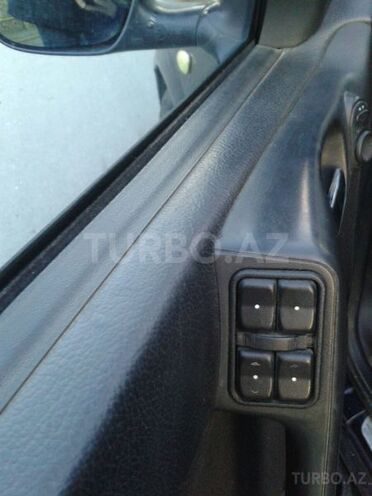 Opel Astra 1998, 325,600 km - 1.6 l - Qax