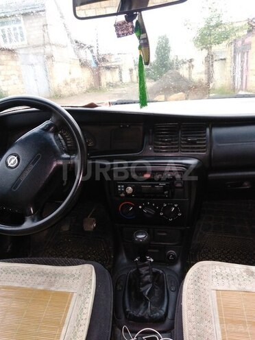 Opel Vectra 1996, 310,080 km - 1.6 l - Quba