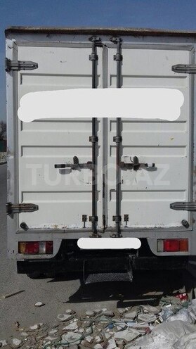 Isuzu NKR 55 L 2008, 215,000 km - 2.8 л - Bakı