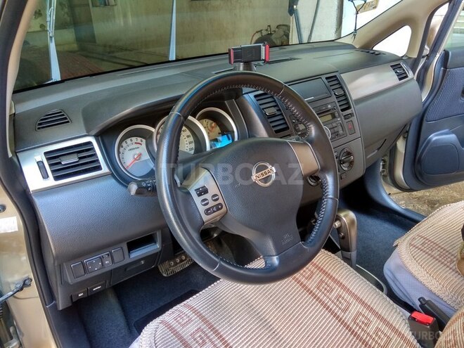 Nissan Tiida 2009, 4,920,016 km - 1.6 l - Bakı