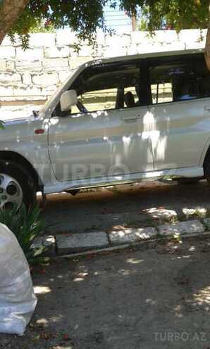 Mitsubishi Pajero io 1999, 150,000 km - 1.8 l - Bakı