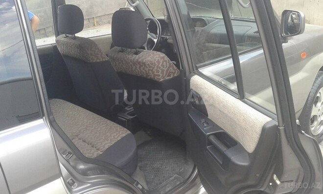 Mitsubishi Pajero io 1999, 299,000 km - 1.8 l - Bakı
