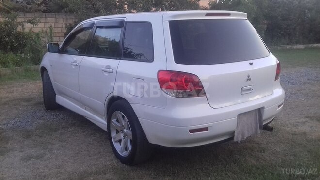 Mitsubishi Airtrek 2002, 168,032 km - 2.0 l - Saatlı