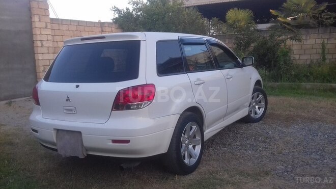 Mitsubishi Airtrek 2002, 168,032 km - 2.0 l - Saatlı