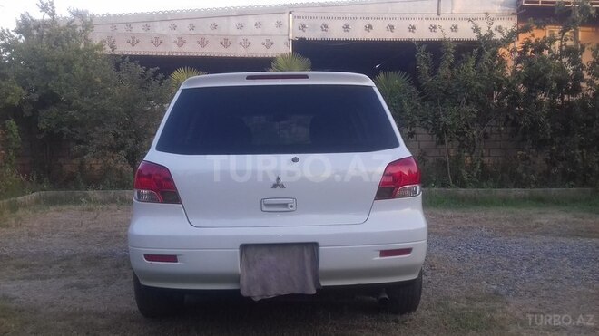 Mitsubishi Airtrek 2002, 168,032 km - 2.0 l - Saatlı