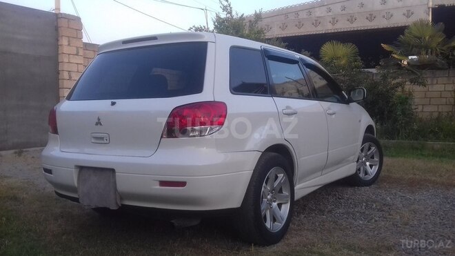Mitsubishi Airtrek 2002, 168,032 km - 2.0 l - Saatlı