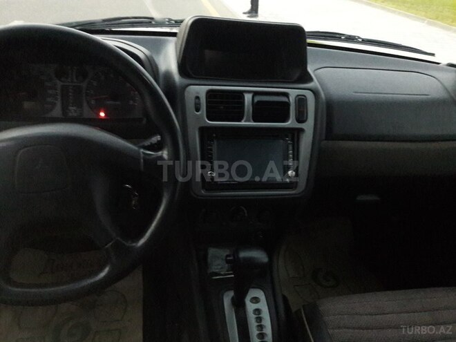 Mitsubishi Pajero io 2003, 265,000 km - 2.0 л - Bakı