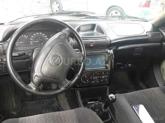 Opel Astra 1998, 356,236 km - 0.1 l - Qazax
