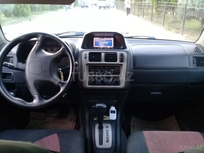 Mitsubishi Pajero io 1999, 256,364 km - 1.8 l - Bakı