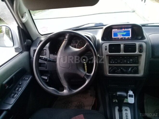 Mitsubishi Pajero io 1999, 256,364 km - 1.8 l - Bakı
