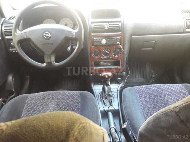 Opel Astra 1999, 300,000 km - 1.6 l - Quba