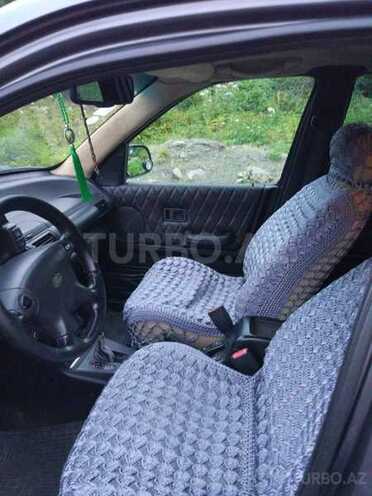 Land Rover Freelander 2002, 288,000 km - 2.5 l - Qax