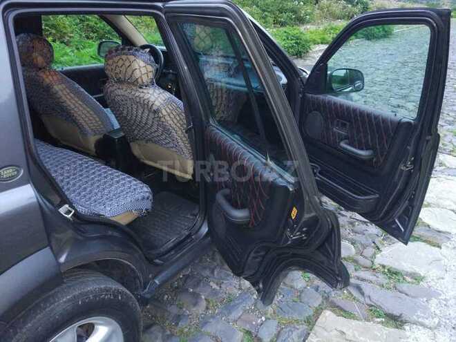 Land Rover Freelander 2002, 288,000 km - 2.5 l - Qax