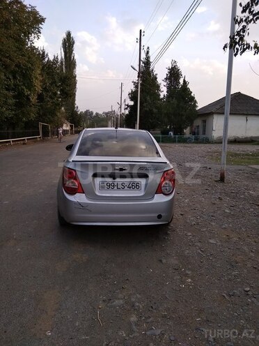 Chevrolet Aveo 2012, 1,108,000 km - 1.5 l - Qax
