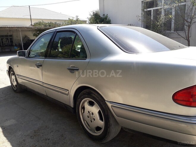 Mercedes E 230 1996, 166,326 km - 2.3 l - Bakı