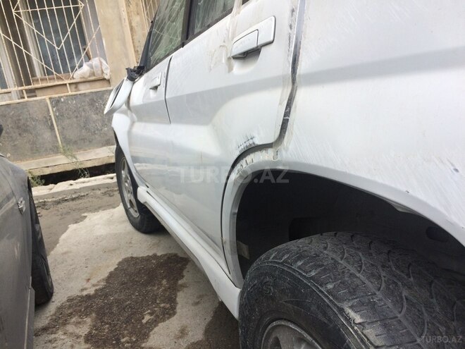 Mitsubishi Pajero io 2003, 132,000 km - 2.0 l - Bakı