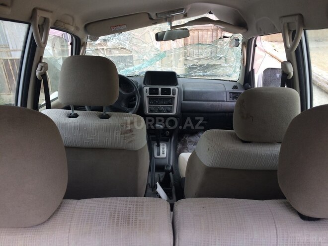 Mitsubishi Pajero io 2003, 132,000 km - 2.0 l - Bakı