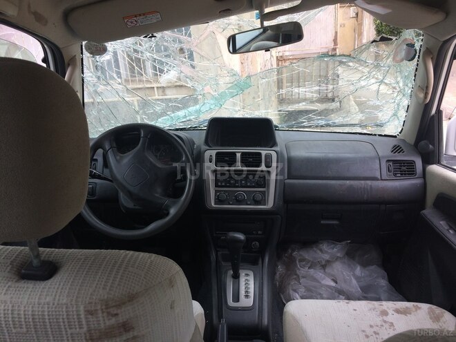 Mitsubishi Pajero io 2003, 132,000 km - 2.0 l - Bakı