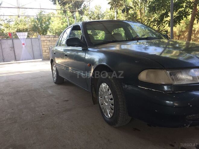 Hyundai Sonata 1996, 352,000 km - 0.2 l - Saatlı