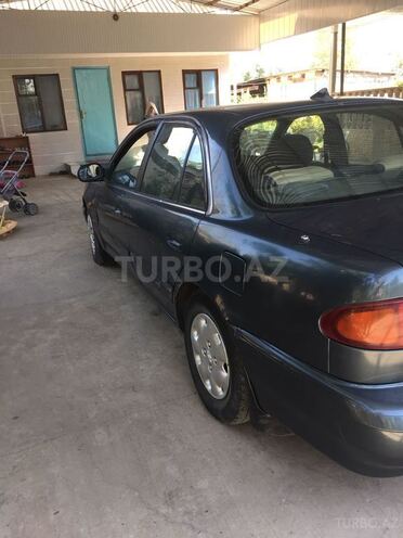 Hyundai Sonata 1996, 352,000 km - 0.2 l - Saatlı