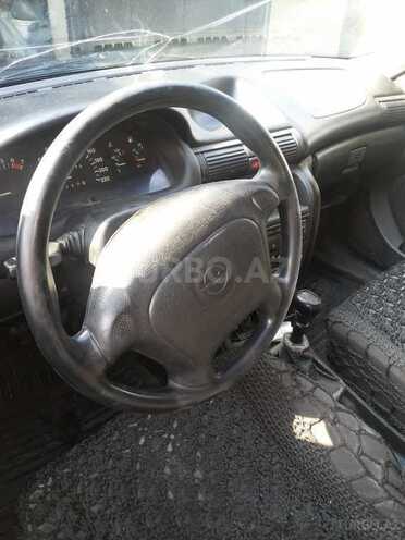 Opel Astra 1995, 300,000 km - 1.6 л - Bakı